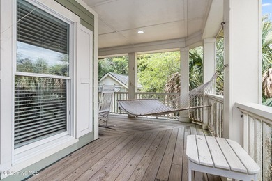Discover this charming, well-kept secret nestled right in the - photo 6