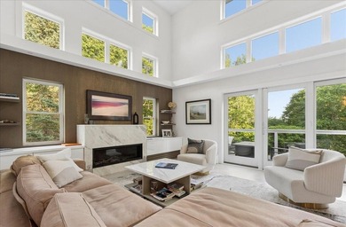 Discover refined coastal living in this beautifully renovated - photo 4