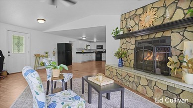 Enjoy the best of Muskegon River living with this updated - photo 12