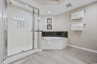 This fully furnished 3BR/3BA end unit offers a stunning