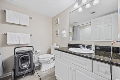 This fully furnished 3BR/3BA end unit offers a stunning