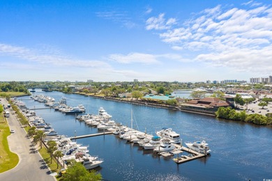 This fully furnished 3BR/3BA end unit offers a stunning