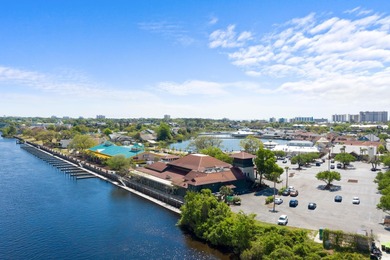 This fully furnished 3BR/3BA end unit offers a stunning