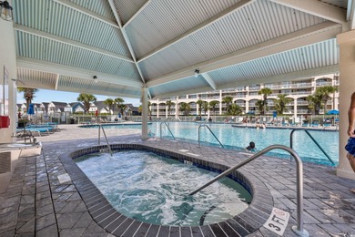 This fully furnished 3BR/3BA end unit offers a stunning