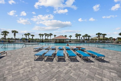 This fully furnished 3BR/3BA end unit offers a stunning