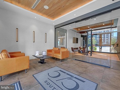 Welcome to Residence #215 at 575 South, where effortless luxury