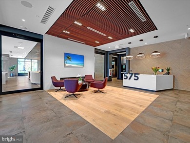 Welcome to Residence #215 at 575 South, where effortless luxury