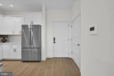 Welcome to Residence #215 at 575 South, where effortless luxury