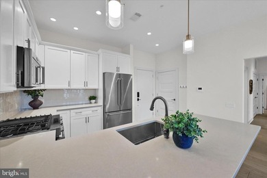 Welcome to Residence #215 at 575 South, where effortless luxury