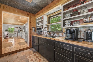 Tucked into the rolling hills of the Ozarks, with private - photo 31