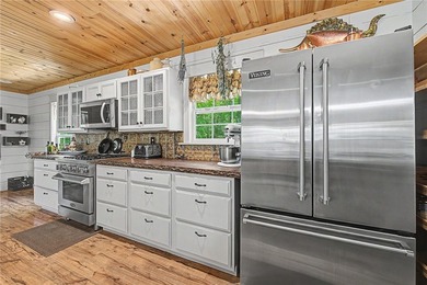 Tucked into the rolling hills of the Ozarks, with private - photo 33