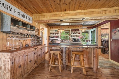 Tucked into the rolling hills of the Ozarks, with private - photo 36