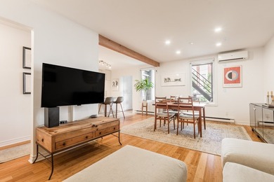 Magnifique condo de 2 chambres offrant un parfait melange de - photo 2