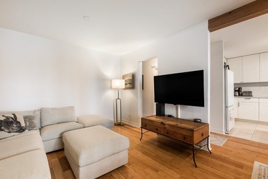 Magnifique condo de 2 chambres offrant un parfait melange de - photo 9