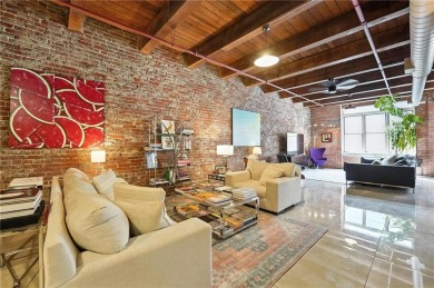 Ready to live in a boutique condo building in the historic