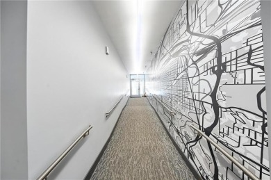 Ready to live in a boutique condo building in the historic