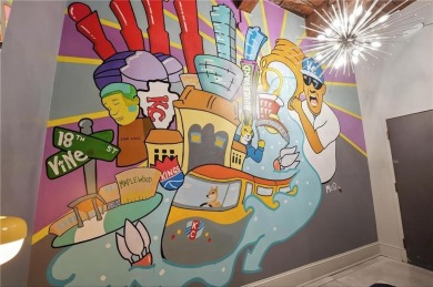 Ready to live in a boutique condo building in the historic