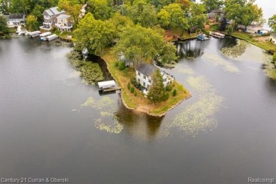 Lake Home For Sale in Wolverine Lake, Michigan