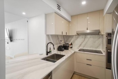 Experience breathtaking bay views from this beautifully