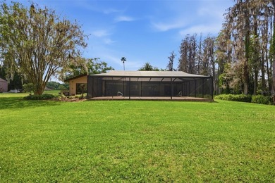 Positioned along the shores of Lake Kell in Lutz, this is a rare - photo 23