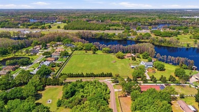 Positioned along the shores of Lake Kell in Lutz, this is a rare - photo 26