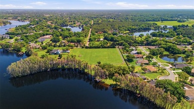 Positioned along the shores of Lake Kell in Lutz, this is a rare - photo 28