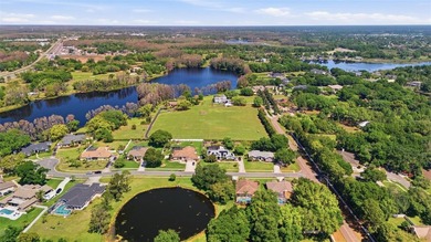Positioned along the shores of Lake Kell in Lutz, this is a rare - photo 29