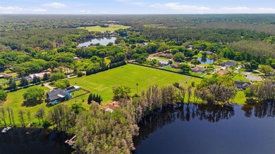 Positioned along the shores of Lake Kell in Lutz, this is a rare - photo 33