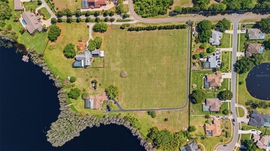Positioned along the shores of Lake Kell in Lutz, this is a rare - photo 37