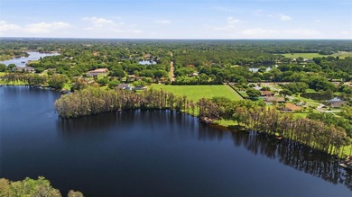 Positioned along the shores of Lake Kell in Lutz, this is a rare - photo 40