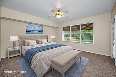 **GROUND FLOOR END UNIT WITH POND VIEWS, GARAGE, AND 3 BEDROOMS - photo 22