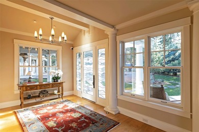 Privately gated on 3.81 acres of coveted Finley Point, this - photo 12
