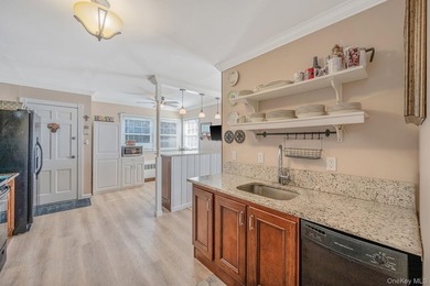 NASSAU SHORES! NO FLOOD! 3746 sqft updated 7 bedroom, 4.5 bath - photo 22
