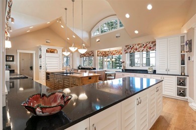 Privately gated on 3.81 acres of coveted Finley Point, this - photo 23