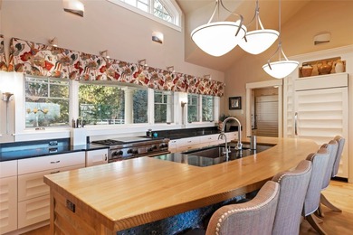 Privately gated on 3.81 acres of coveted Finley Point, this - photo 24