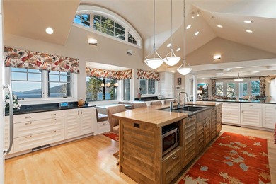 Privately gated on 3.81 acres of coveted Finley Point, this - photo 26