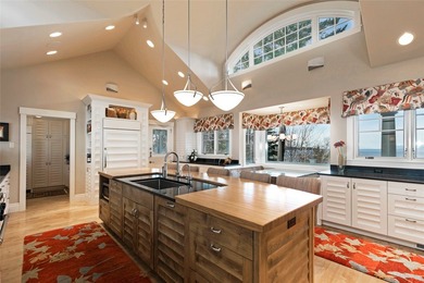 Privately gated on 3.81 acres of coveted Finley Point, this - photo 27
