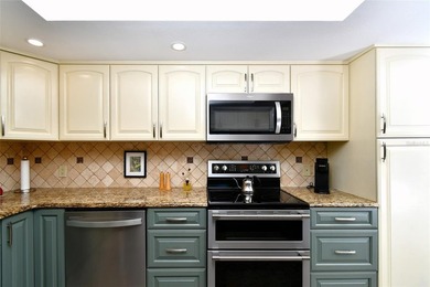 THE UNIT FEATURES NEW TILE FLOORING. IT HAS A SPACIOUS OPEN / - photo 14