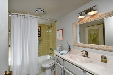 THE UNIT FEATURES NEW TILE FLOORING. IT HAS A SPACIOUS OPEN / - photo 17