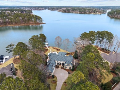 COMPLETELY RENOVATED ESTATE COMMANDING MAIN-LAKE VIEWS IN A - photo 2