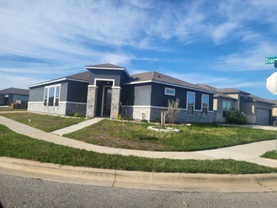 Stunning three-year-old home on a desirable corner lot featuring - photo 1