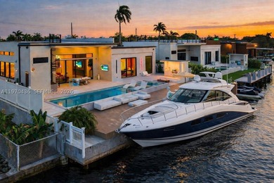 Stunning 4BR/4.5BA waterfront home in gated Bal Harbour. Nearly - photo 1