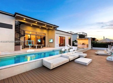 Stunning 4BR/4.5BA waterfront home in gated Bal Harbour. Nearly - photo 5