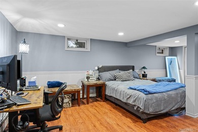 Charming four-bedroom, two bath Cape Cod located in Islip - photo 16