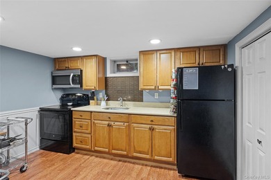 Charming four-bedroom, two bath Cape Cod located in Islip - photo 19