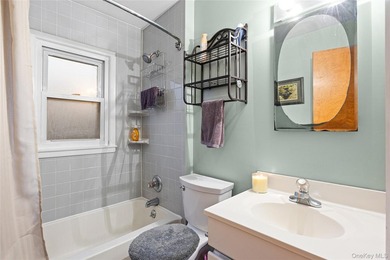 Charming four-bedroom, two bath Cape Cod located in Islip - photo 22