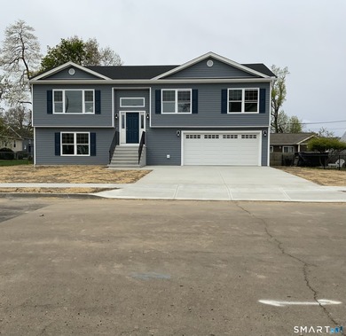 This beautifully designed 3,150 sq. ft. split-level home offers - photo 1