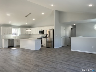 This beautifully designed 3,150 sq. ft. split-level home offers - photo 3