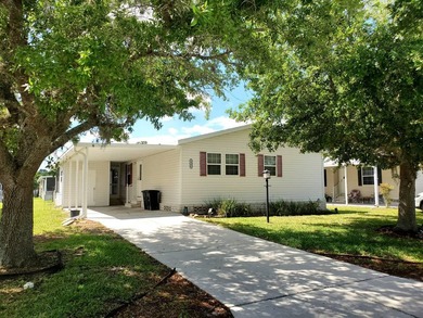 THIS HOME IS ON LEASED LAND WITH A MONTHLY LOT RENT OF $542 AND - photo 3