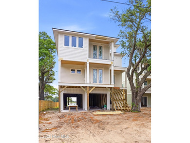 Welcome to coastal living at its absolute finest in highly - photo 3